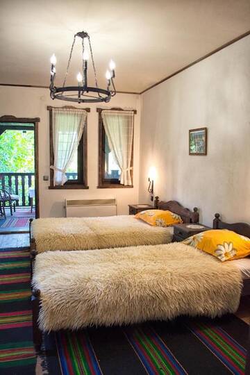Фото номера Трехместный номер Загородные дома Milkovata Guest House г. Koshov 3